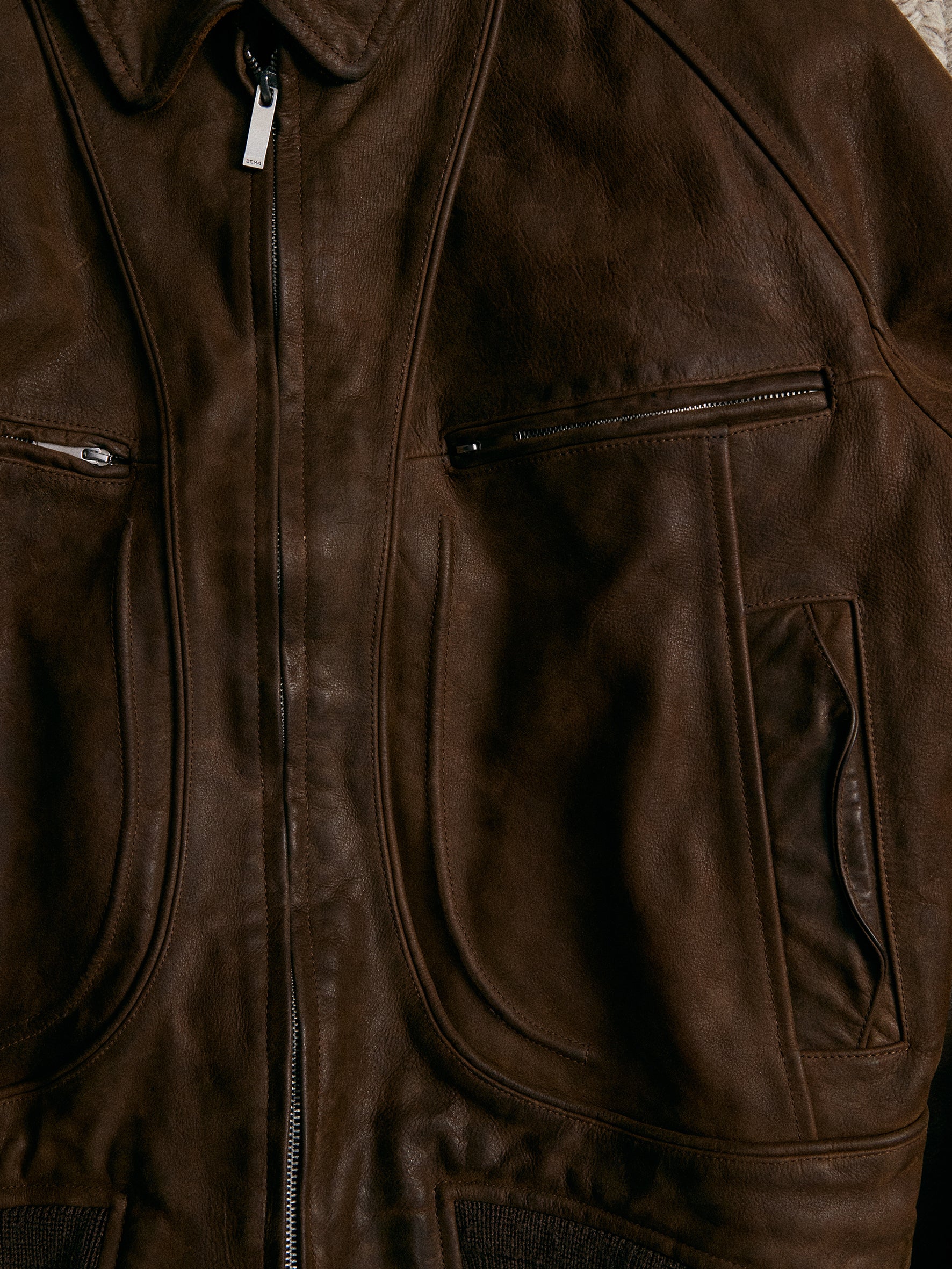 011 - Moccasin Memory Faded A-2 Leather Jacket